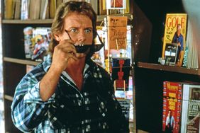 Roddy Piper on the set of "They Live". (Photo by Sunset Boulevard/Corbis via Getty Images)