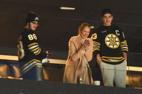 Singer Celine Dion and her sons after the game of the Boston Bruins against the New York Rangers at the TD Garden on March 21, 2024 in Boston, Massachusetts. 