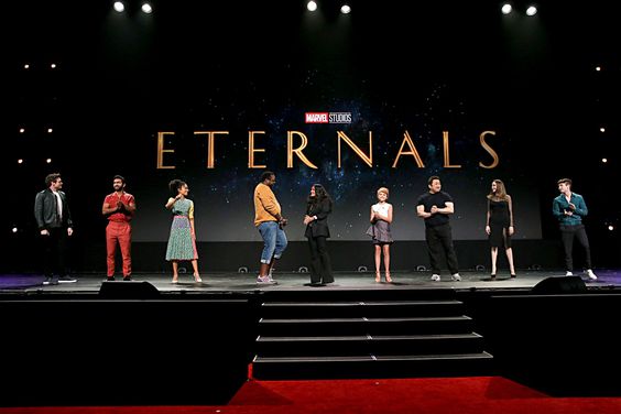 ANAHEIM, CALIFORNIA - AUGUST 24: (L-R) Richard Madden, Kumail Nanjiani, Lauren Ridloff, Salma Hayek, Lia McHugh, Don Lee, Angelina Jolie, and Barry Keoghan of 'The Eternals' took part today in the Walt Disney Studios presentation at Disney&rsquo;s D23 EXPO 2019 in Anaheim, Calif. 'The Eternals' will be released in U.S. theaters on November 6, 2020. (Photo by Jesse Grant/Getty Images for Disney)