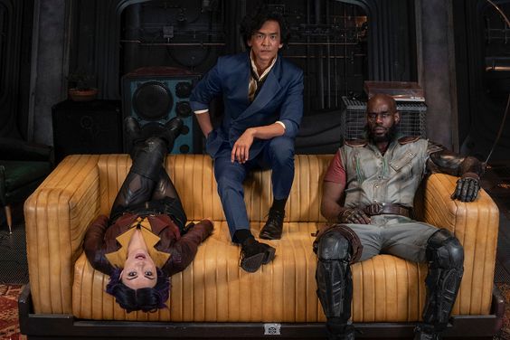 COWBOY BEBOP (L to R) DANIELLA PINEDA as FAYE VALENTINE, JOHN CHO as SPIKE SPIEGEL and MUSTAFA SHAKIR as JET BLACK on the set of COWBOY BEPOP