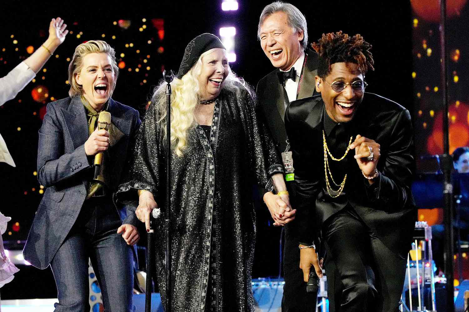 Brandi Carlile, Joni Mitchell, and Jon Batiste perform onstage during MusiCares Person of the Year honoring Joni Mitchell at MGM Grand Marquee Ballroom on April 01, 2022 in Las Vegas, Nevada.