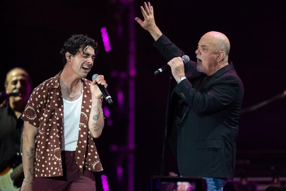 Mandatory Credit: Photo by Dave Hogan/Hogan Media/Shutterstock (13979713hj) Joe Jonas and Billy Joel perform on stage on Day 8 of American Express Presents BST Hyde Park on July 7, 2023 in London, United, Kingdom. (Photo by Dave Hogan/Hogan Media/Shutterstock) American Express presents BST Hyde Park, Day 8, London, UK - 07 Jul 2023