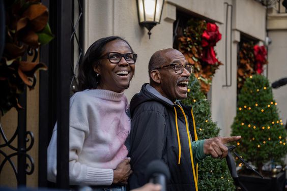 Al Roker and his wife, Deborah, being surprised by 'Today' staffers with Christmas carols