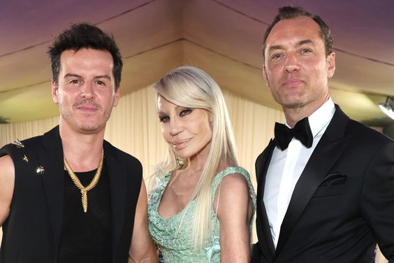 Andrew Scott, Donatella Versace, and Jude Law attend The 2024 Met Gala Celebrating "Sleeping Beauties: Reawakening Fashion" at The Metropolitan Museum of Art on May 06, 2024 