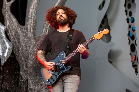 oe Trohman of Fall Out Boy performs during the Hella Mega Tour at Comerica Park on August 10, 2021 in Detroit, Michigan.