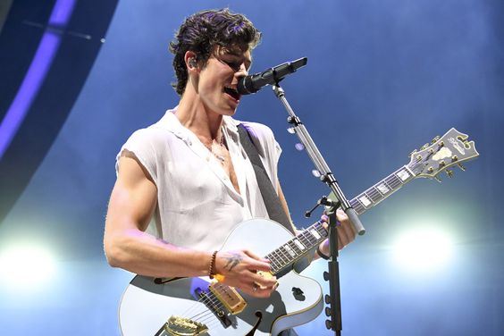 PORTLAND, OREGON - JUNE 12: Shawn Mendes performs during the kick off of the North American leg of "Shawn Mendes: The Tour" at Moda Center on June 12, 2019 in Portland, Oregon. (Photo by Kevin Mazur/Getty Images for SM)