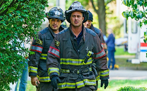 ALL CROPS: CHICAGO FIRE -- "One Hundred" Episode 508 -- Pictured: (l-r) Joe Minoso as Joe Cruz, Taylor Kinney as Kelly Severide -- (Photo by: Parrish Lewis/NBC