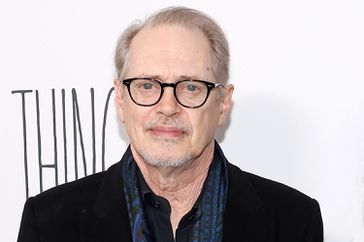 Steve Buscemi and Karen Ho attend the premiere of "Poor Things"