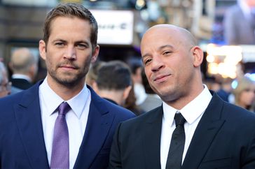 Paul Walker and Vin Diesel attend the world premiere of 'Fast And Furious 6' at The Empire Leicester Square on May 7, 2013 in London, England.