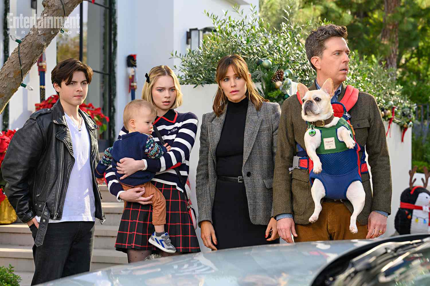 Family Switch - (L to R) Brady Noon as Wyatt, Emma Myers as CC, Lincoln Alex Sykes and Theodore Brian Sykes as Baby Miles, Jennifer Garner as Jess Walker and Ed Helms as Bill Walker in Family Switch. Cr. Colleen Hayes/Netflix Â© 2023.