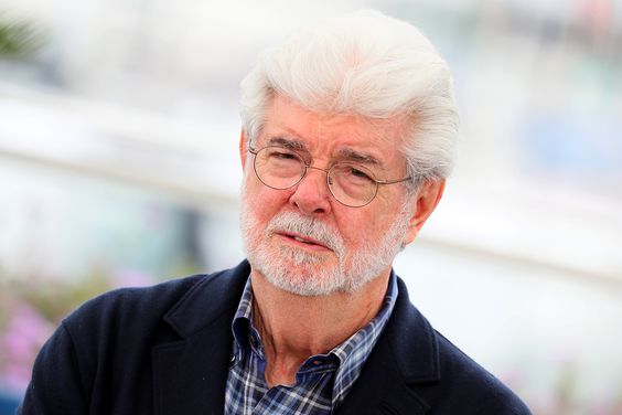 George Lucas attends a photocall as he is awarded the Palme D'Or D'Honneur at the 77th annual Cannes Film Festival.
