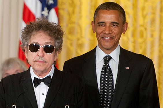 ALL CROPS: 145427705 Bob Dylan receives the Presidential Medal of Freedom from President Barack Obama in the East Room of the White House on May 29, 2012 in Washington, DC. (Photo by Leigh Vogel/WireImage)