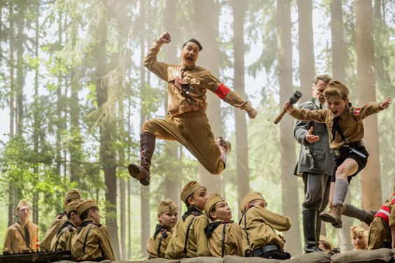 Taika Waititi and Roman Griffin Davis in the film JOJO RABBIT. Photo by Kimberley French. &copy; 2019 Twentieth Century Fox Film Corporation All Rights Reserved CR: Kimberley French/Twentieth Century Fox