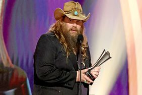 FRISCO, TEXAS - MAY 11: Chris Stapleton accepts the Entertainer of the Year award onstage during the 58th Academy Of Country Music Awards at The Ford Center at The Star on May 11, 2023 in Frisco, Texas. (Photo by Theo Wargo/Getty Images)