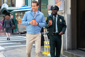 Ryan Reynolds as Guy and Lil Rel Howery as Buddy in 20th Century Studios&rsquo; FREE GUY.