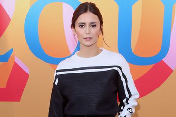 Nina Dobrev attends Louis Vuitton's "200 Trunks, 200 Visionaries: The Exhibition" at Louis Vuitton Beverly Hills Rodeo Drive on July 28, 2022 in Beverly Hills, California