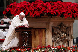 Pope Francis leads the Christmas Eve mass in Saint Peter's Basilica at the Vatican