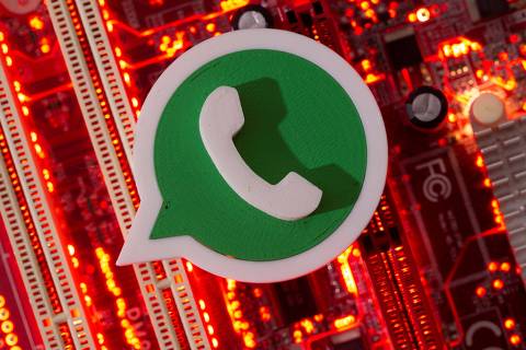 FILE PHOTO: A 3D printed Whatsapp logo is placed on a computer motherboard in this illustration taken January 21, 2021. REUTERS/Dado Ruvic/Illustration/File Photo ORG XMIT: FW1