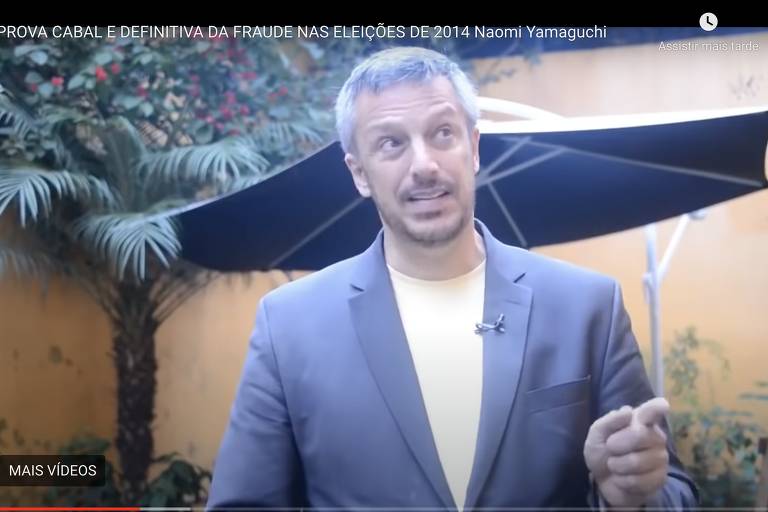 Reprodução de vídeo do YouTube sobre suposta fraude eleitoral em 2014, com astrólogo Alexandre Chut. 