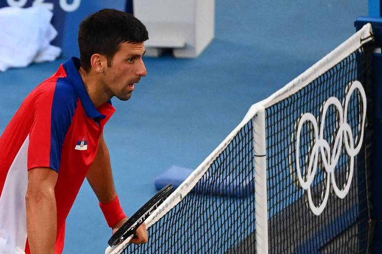 Número 1 do mundo e vencedor de três  Grand Slam no ano, o sérvio Novak Djokovic parece não acreditar após perder a medalha de bronze para o espanho Pablo Carreno Busta
