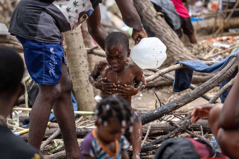 John Moore fotografa haitianos em acampamento improvisado na fronteira entre México e EUA