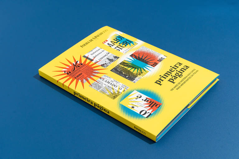 livro com capa amarela e detalhes vermelhos e azuis