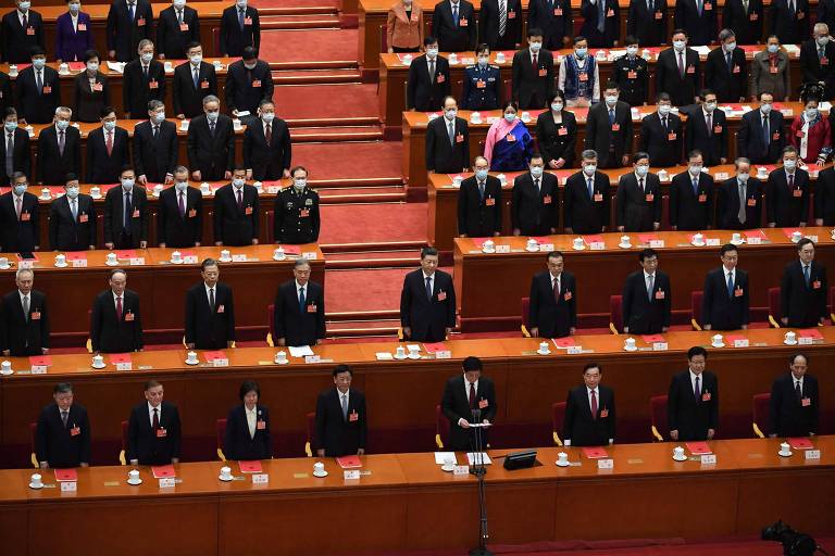 Líderes e delegados da China participam da cerimônia de encerramento do Congresso Nacional do Povo, em Pequim