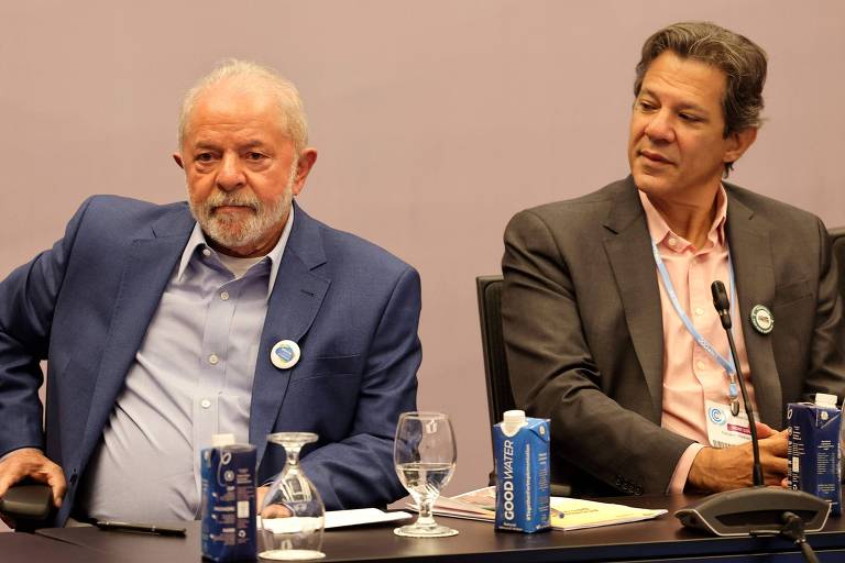 O presidente Lula (esq.), ao lado de Fernando Haddad