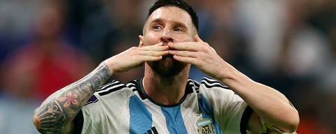 Soccer Football - FIFA World Cup Qatar 2022 - Semi Final - Argentina v Croatia - Lusail Stadium, Lusail, Qatar - December 13, 2022 Argentina's Lionel Messi celebrates after Julian Alvarez scores their third goal REUTERS/Kai Pfaffenbach     TPX IMAGES OF THE DAY