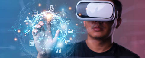 Metaverse and Future digital technology.Man wearing VR glasses hand touching virtual Global Internet connection metaverse.Global Business, Digital marketing, Metaverse, Digital link tech, Big data