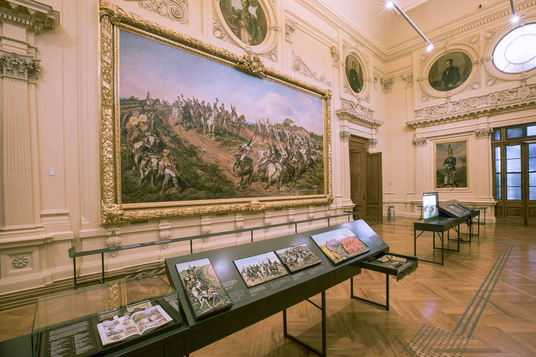 A imagem mostra uma das salas de exposição do Museu do Ipiranga, na parede está o quadro ‘O Grito do Ipiranga’, 
de Pedro Américo
