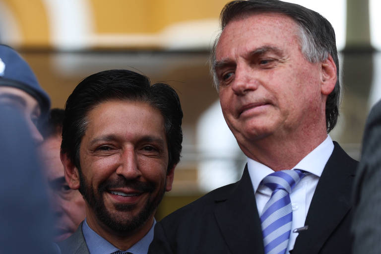 Prefeito Ricardo Nunes (MDB) e ex-presidente Jair Bolsonaro em evento no batalhao da Rota em SP
