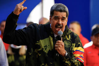 Venezuela's President Nicolas Maduro addresses supporters at an event, in Caracas