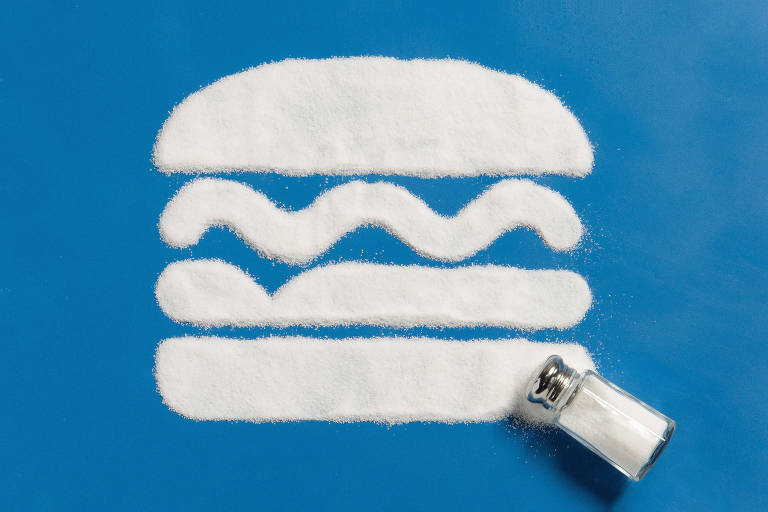 Hamburguer desenhado com pó branco, indicando sal, em um fundo azul