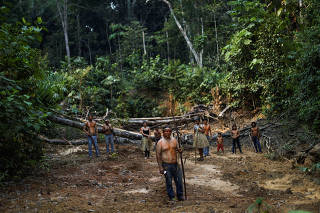 FILE PHOTO: Indigenous Mura people pose for a picture in a deforested area of a non-demarcated indigenous land in the Amazon rainforest near Humaita