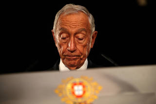 FILE PHOTO: Portugal's President de Sousa addresses the nation from Belem Palace to announce his decision to dissolve parliament, in Lisbon