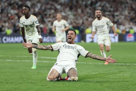 Real Madrid's Spanish forward #14 Joselu celebrates scoring during the UEFA Champions League semi final second leg football match between Real Madrid CF and FC Bayern Munich at the Santiago Bernabeu stadium in Madrid on May 8, 2024. (Photo by Thomas COEX / AFP)