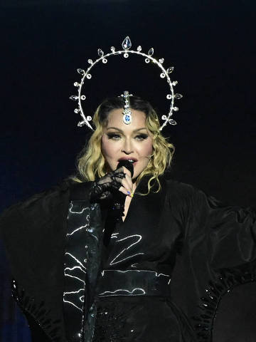 TOPSHOT - US pop star Madonna performs onstage during a free concert at Copacabana beach in Rio de Janeiro, Brazil, on May 4, 2024. . Madonna ended her The Celebration Tour with a performance attended by some 1.5 million enthusiastic fans. (Photo by Pablo PORCIUNCULA / AFP)