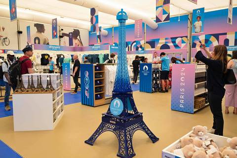 This photograph shows Eiffel tower models for sale at an official Paris 2024 Summer Olympic and Paralympic Games store during the opening ceremony, in Paris on June 27, 2024. (Photo by Bertrand GUAY / AFP)