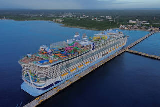 Royal Caribbean's Icon of the Seas, the largest cruise ship in the world, is docked in Mahahual