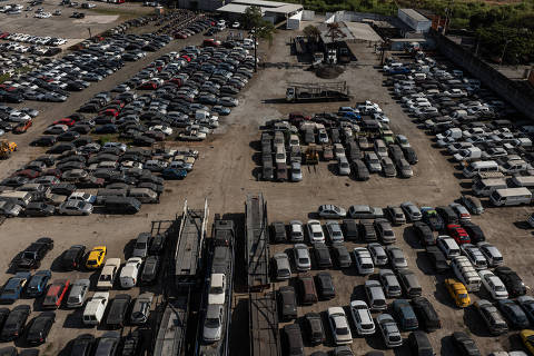 SÃO PAULO - SP - BRASIL - 05-07-2024 - Vista de drone Veículos apreendidos no Pátio de Recolhimento de Veículos de Guarulhos, localizado na Rua Benedito Climério de Santana. O Detran vai retomar neste mês de julho, depois de um ano, os leilões de veículos apreendidos e levados para pátios no estado de São Paulo.
(Foto: Rafaela Araújo/Folhapress) *** EXCLUSIVO FOLHA DE SÃO PAULO **.