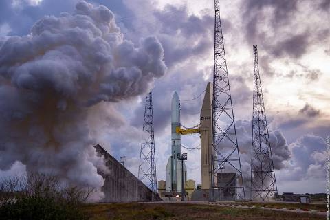 (FILES) This handout photograph taken and released by ArianeGroup on November 23, 2023, shows smoke during a Ariane 6 rocket test run at the Guyanese Space Centre in Kourou, French Guiana. On July 9, 2024 from 3:00 p.m. (6:00 p.m. GMT), the European Space Agency (ESA) is scheduled to carry out the inaugural firing of the heavy launcher from the Guiana space center in Kourou. Decided in 2014, Ariane 6 will be able to place satellites in geostationary orbit, at an altitude of 36,000 kilometers, like its predecessor Ariane 5, as well as put constellations into orbit a few hundred kilometers from Earth. (Photo by P. PIRON / ArianeGroup / AFP) / RESTRICTED TO EDITORIAL USE - MANDATORY CREDIT 