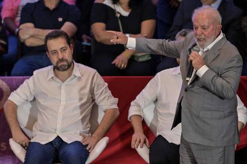 Brazilian President Luiz Inacio Lula da Silva (R) and Sao Paulo's congressman and mayoral pre-candidate for the Socialism and Freedom Party (PSOL), Guilherme Boulos (L), attend the former Sao Paulo's mayor Marta Suplicy's (R) affiliation ceremony to the Workers' Party (PT) in Sao Paulo, Brazil, on February 2, 2024. (Photo by Nelson ALMEIDA / AFP)