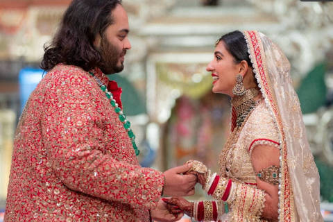 Anant Ambani, son of Indian billionaire Mukesh Ambani, and Radhika Merchant, daughter of industrialist Viren Merchant, react during their wedding celebrations in Mumbai, India, July 12, 2024. Reliance Industries/Handout via REUTERS THIS IMAGE HAS BEEN SUPPLIED BY A THIRD PARTY. NO RESALES. NO ARCHIVES. ORG XMIT: DEL01