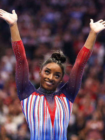 Jun 30, 2024; Minneapolis, Minnesota, USA; Simone Biles celebrates her floor routine during the U.S. Olympic Team Gymnastics Trials at Target Center. Mandatory Credit: Matt Krohn-USA TODAY Sports ORG XMIT: IMAGN-873063