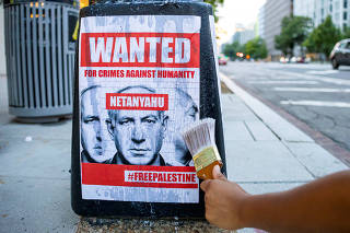 Protesters prepare for the upcoming visit of Israeli Prime Minister Benjamin Netanyahu in Washington