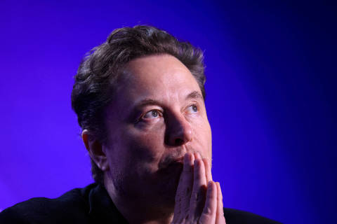 FILE PHOTO: Elon Musk, Chief Executive Officer of SpaceX and Tesla and owner of X looks on during the Milken Conference 2024 Global Conference Sessions at The Beverly Hilton in Beverly Hills, California, U.S., May 6, 2024.  REUTERS/David Swanson/File Photo ORG XMIT: FW1