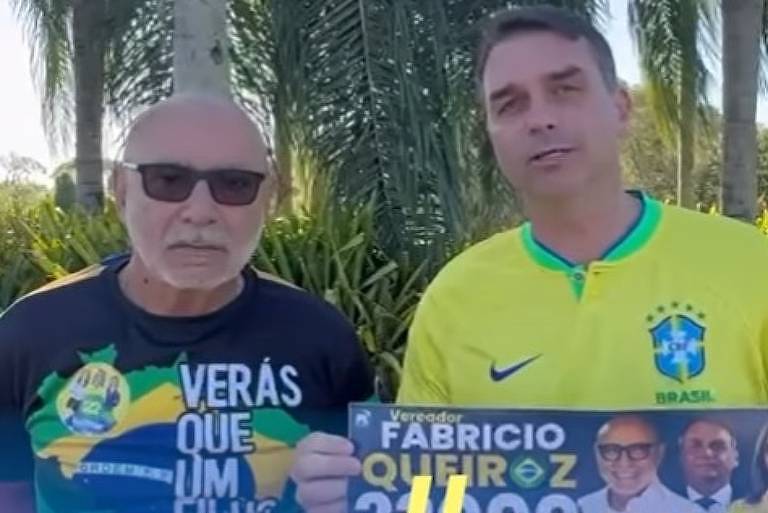 Flávio Bolsonaro grava vídeo ao lado de Queiroz e pede votos para ex-assessor