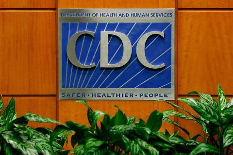 (FILES) A podium with the logo for the Centers for Disease Control and Prevention at the Tom Harkin Global Communications Center on October 5, 2014 in Atlanta, Georgia. The first confirmed Ebola virus patient in the United States was staying with family members at The Ivy Apartment complex before being treated at Texas Health Presbyterian Hospital Dallas. A person in the state of Missouri has become the first in the United States to test positive for bird flu without a known exposure to infected animals, authorities said on September 6, 2024. (Photo by Kevin C. Cox / GETTY IMAGES NORTH AMERICA / AFP)