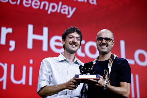 Murilo Hauser and Heitor Lorega Vincent Lindon pose with the Award for Best Screenplay for the movie 